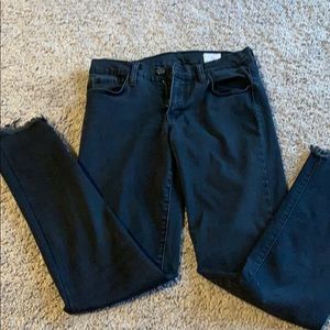 Black frayed buckle jeans